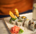 Veggie sushi rolls with avocado, cucumber, and carrots, a great choice for plant-based eaters.